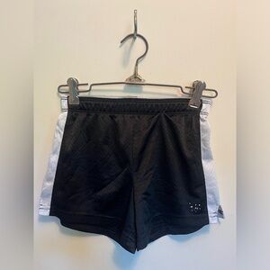Justice, girls youth black shorts with detailed waistband.